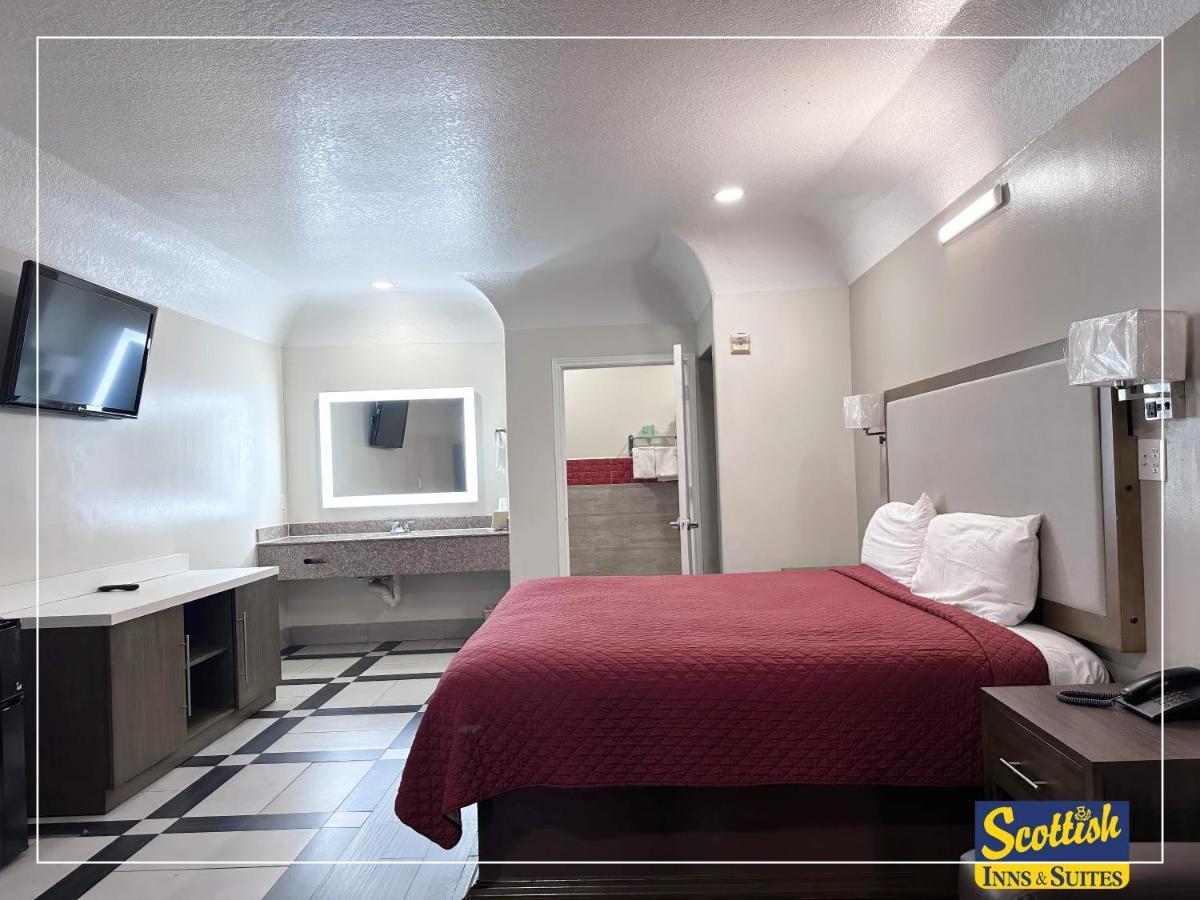 Scottish Inn & Suites Sam Houston Parkway Extérieur photo