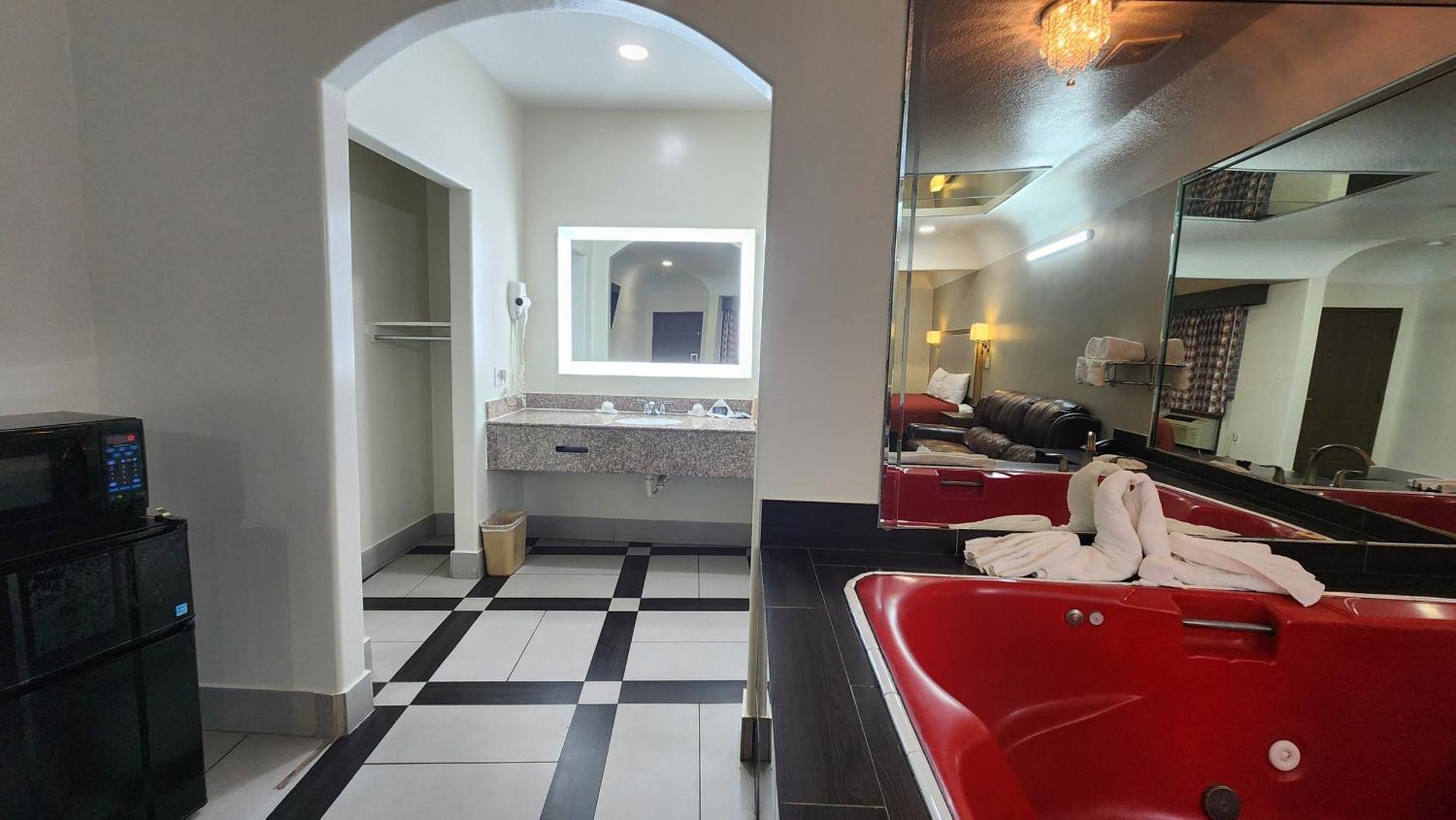 Scottish Inn & Suites Sam Houston Parkway Extérieur photo