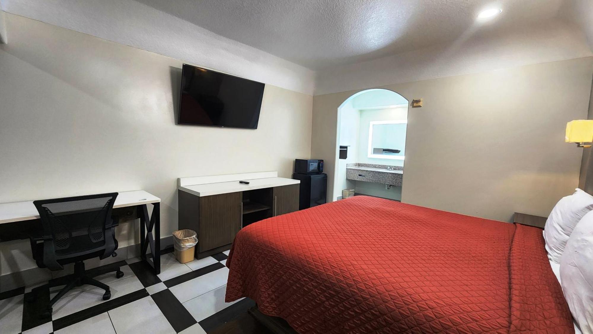 Scottish Inn & Suites Sam Houston Parkway Extérieur photo
