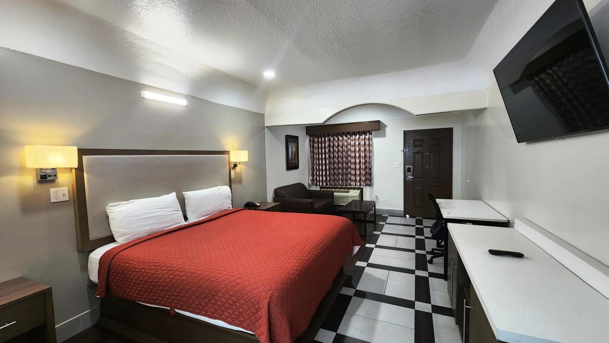 Scottish Inn & Suites Sam Houston Parkway Extérieur photo